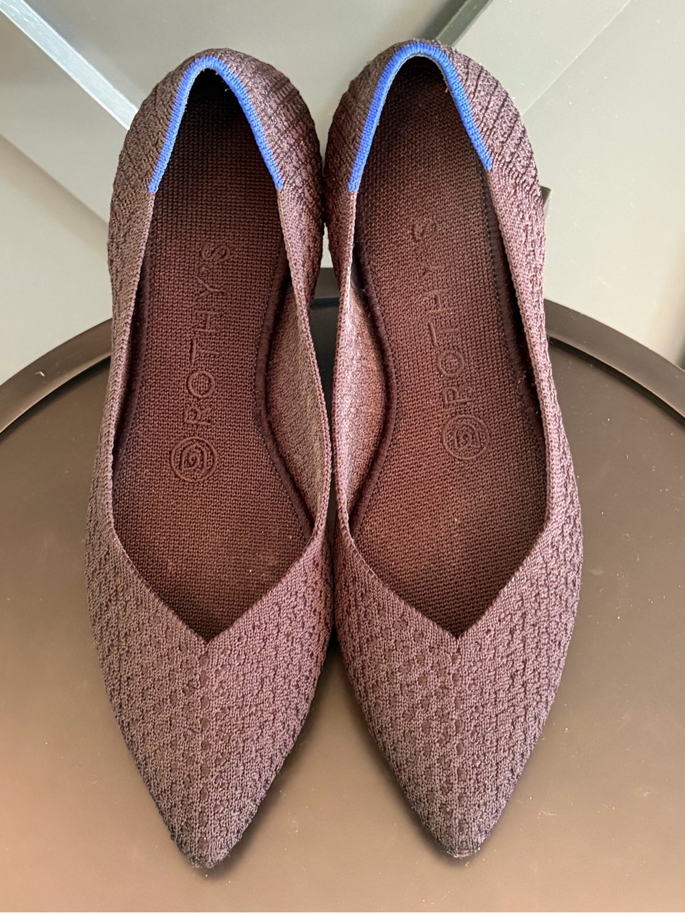 Rothy's Pointed Knit Flats in Black with Blue Trim